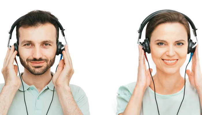 Hearing,Test,,Audiometry.,Man,And,Woman,Wearing,Headphones,Getting,Hearing